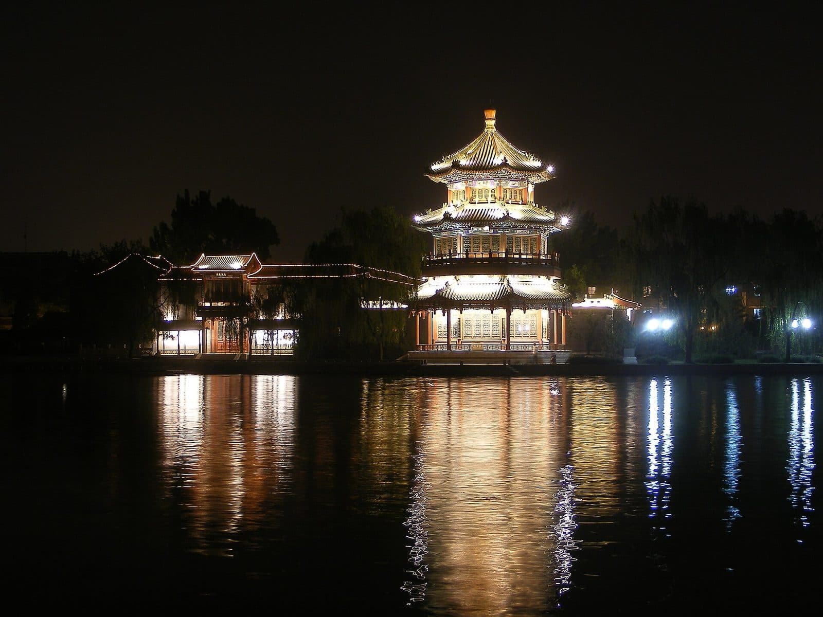 Houhai lake and illuminated pavilion at night in Beijing