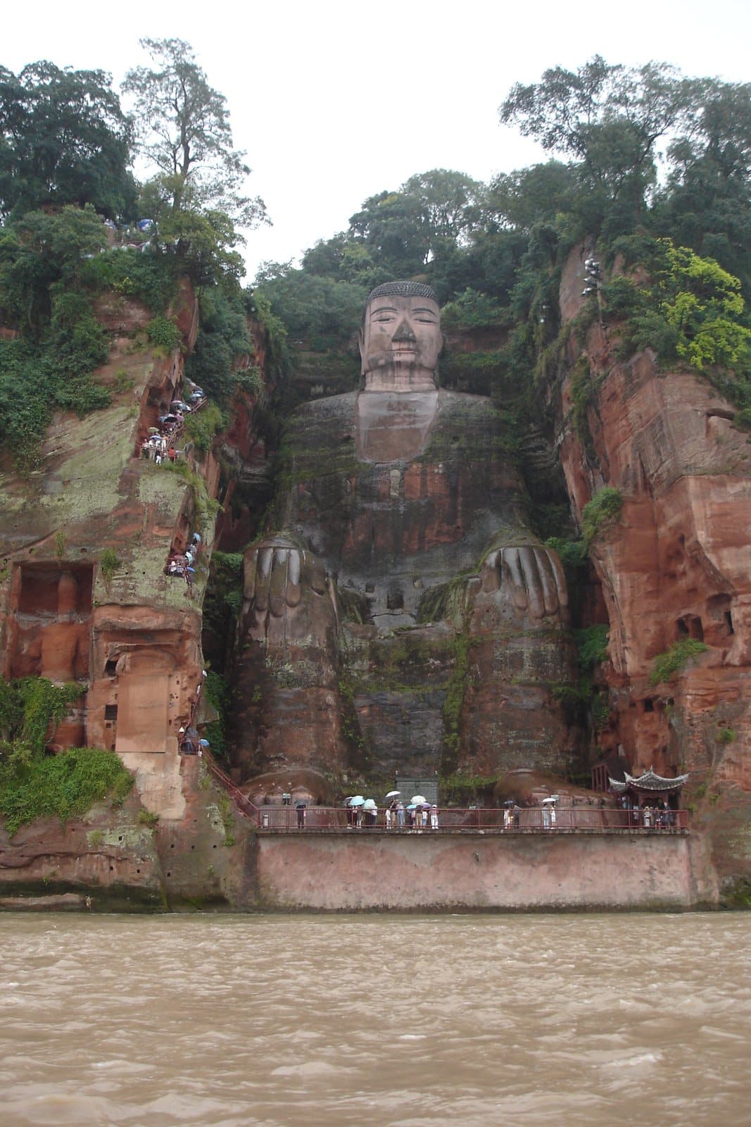 The Leshan Giant Buddha viewed from the river and cliff paths — view 1