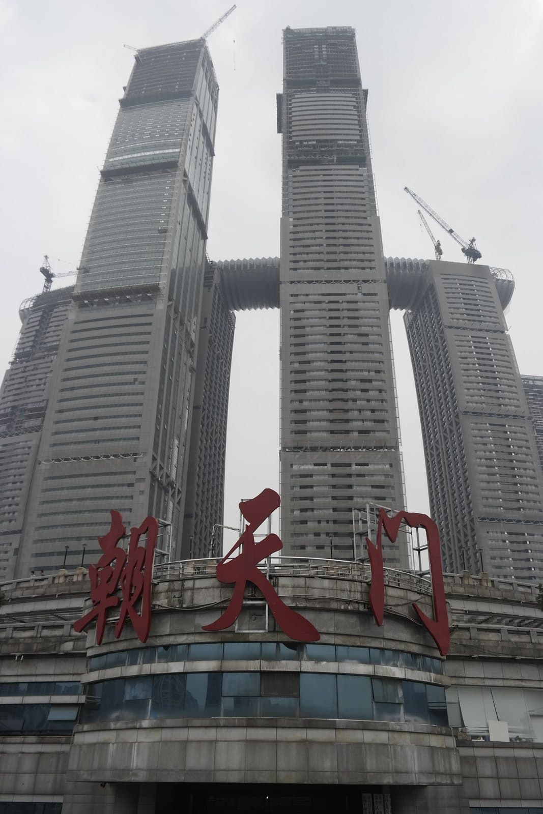 Raffles City skyline at Chongqing's Chaotianmen river confluence — view 2