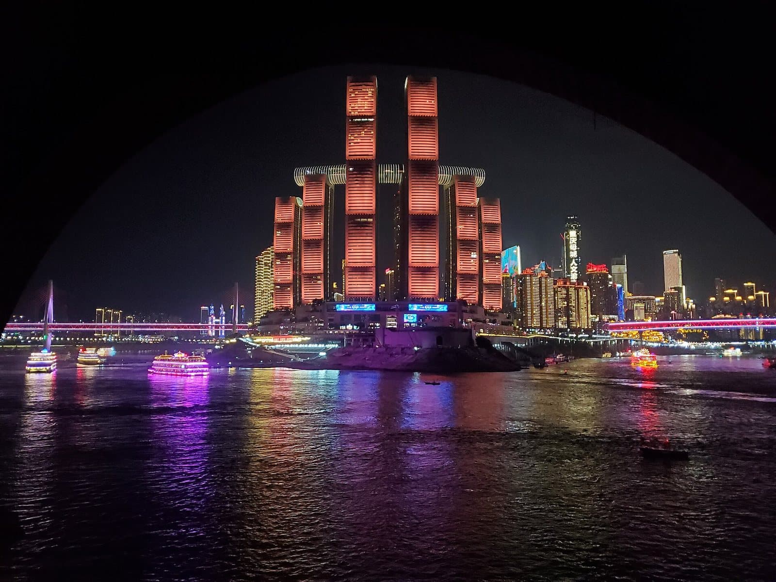 Raffles City skyline at Chongqing's Chaotianmen river confluence — view 3