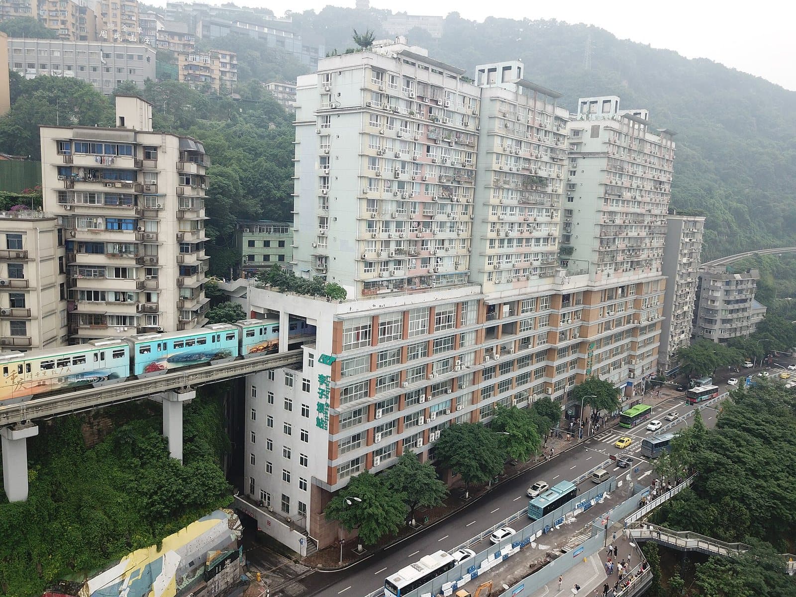 Chongqing monorail passing through Liziba station building — view 3