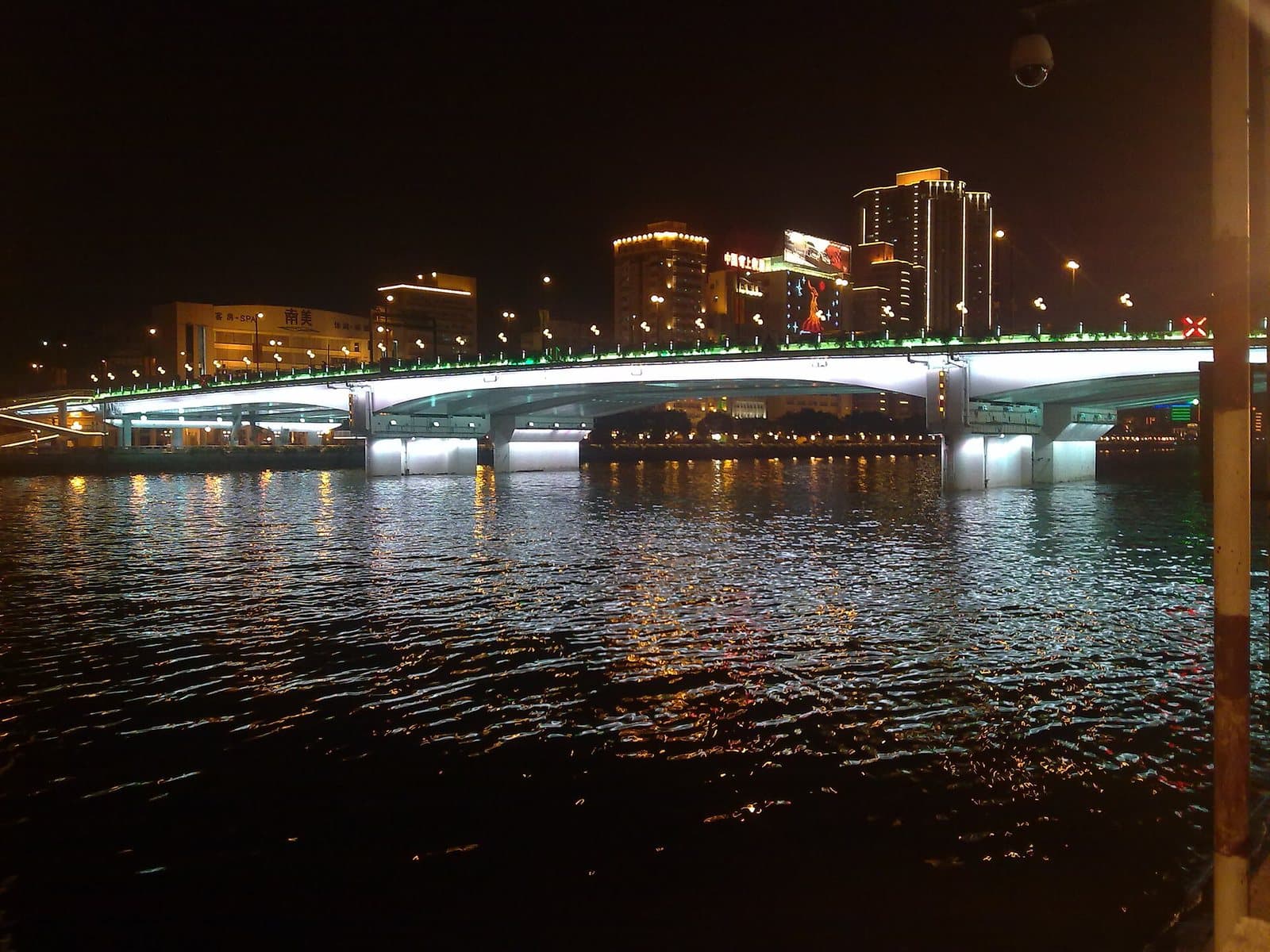 Guangzhou skyline illuminated along the Pearl River — view 1