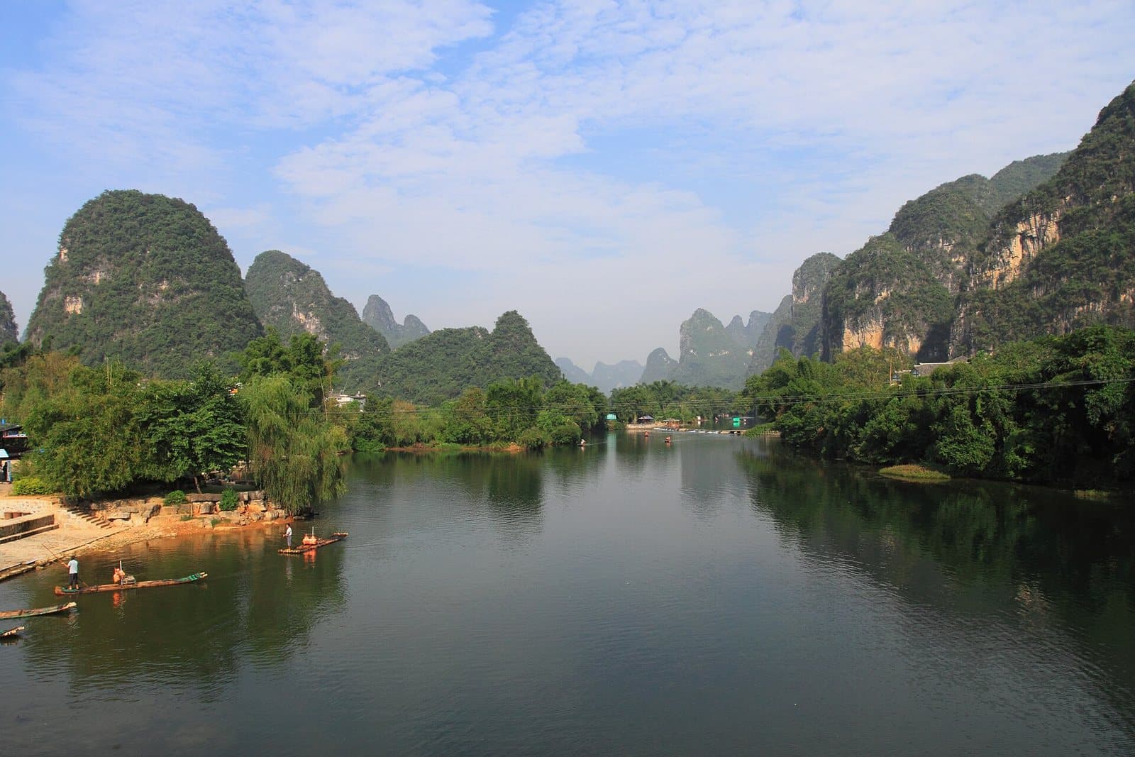 Bamboo rafts, bridges and karst peaks on the Yulong River — view 3