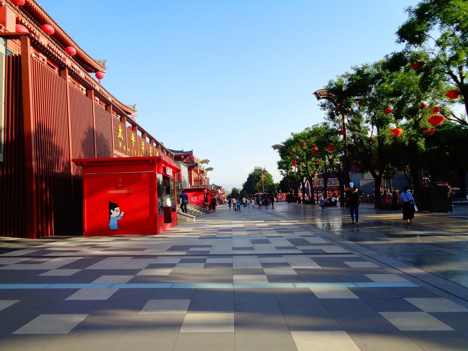 Tang-inspired pedestrian avenue and evening lights at Grand Tang Mall — view 1