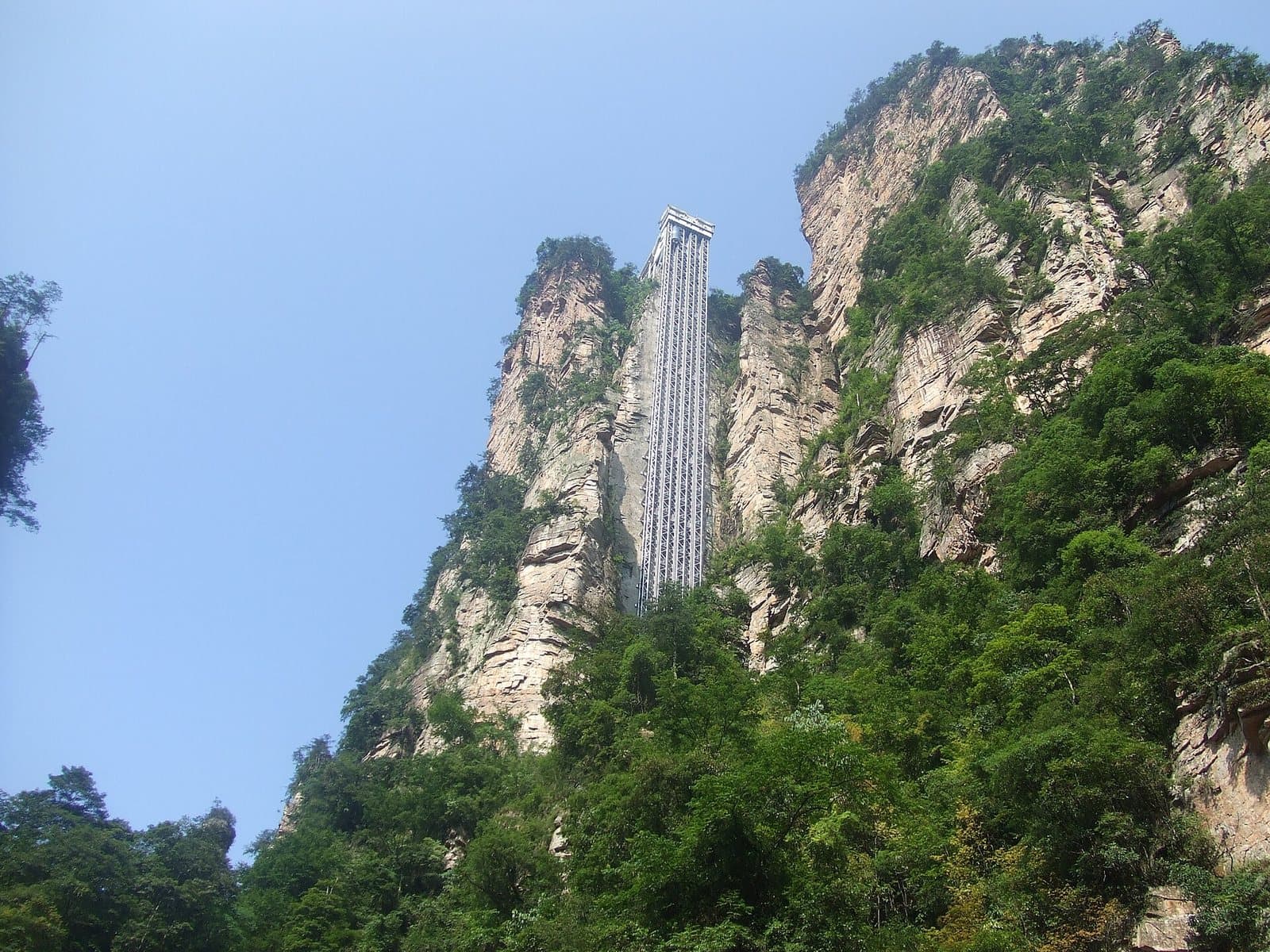 Bailong Elevator rising beside Zhangjiajie's sandstone cliffs — view 3