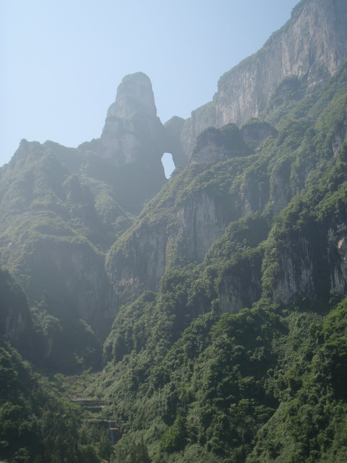 The natural arch and stairway at Tianmen Cave — view 2