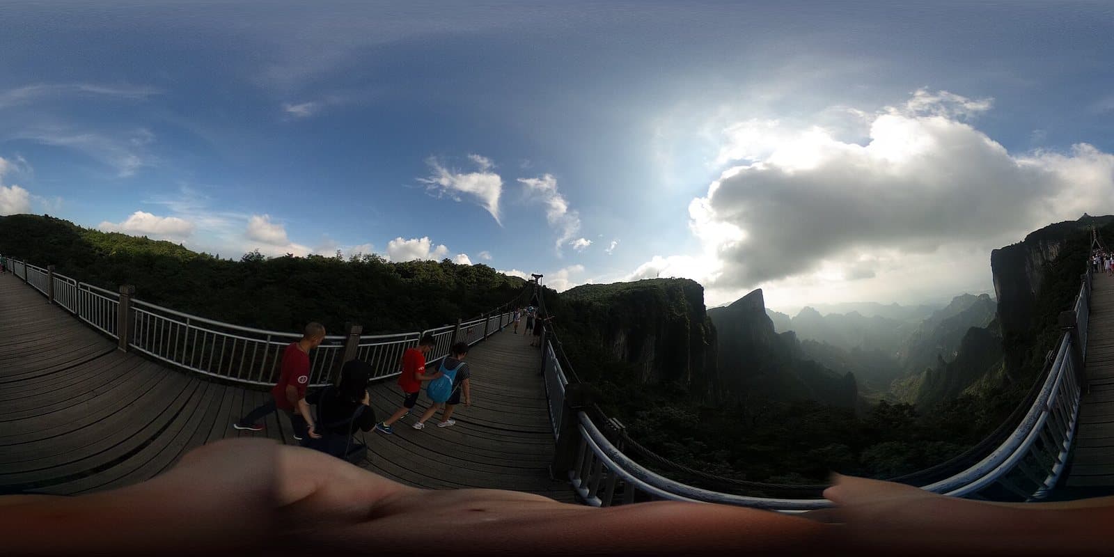 Glass bridge spanning Zhangjiajie Grand Canyon — view 3
