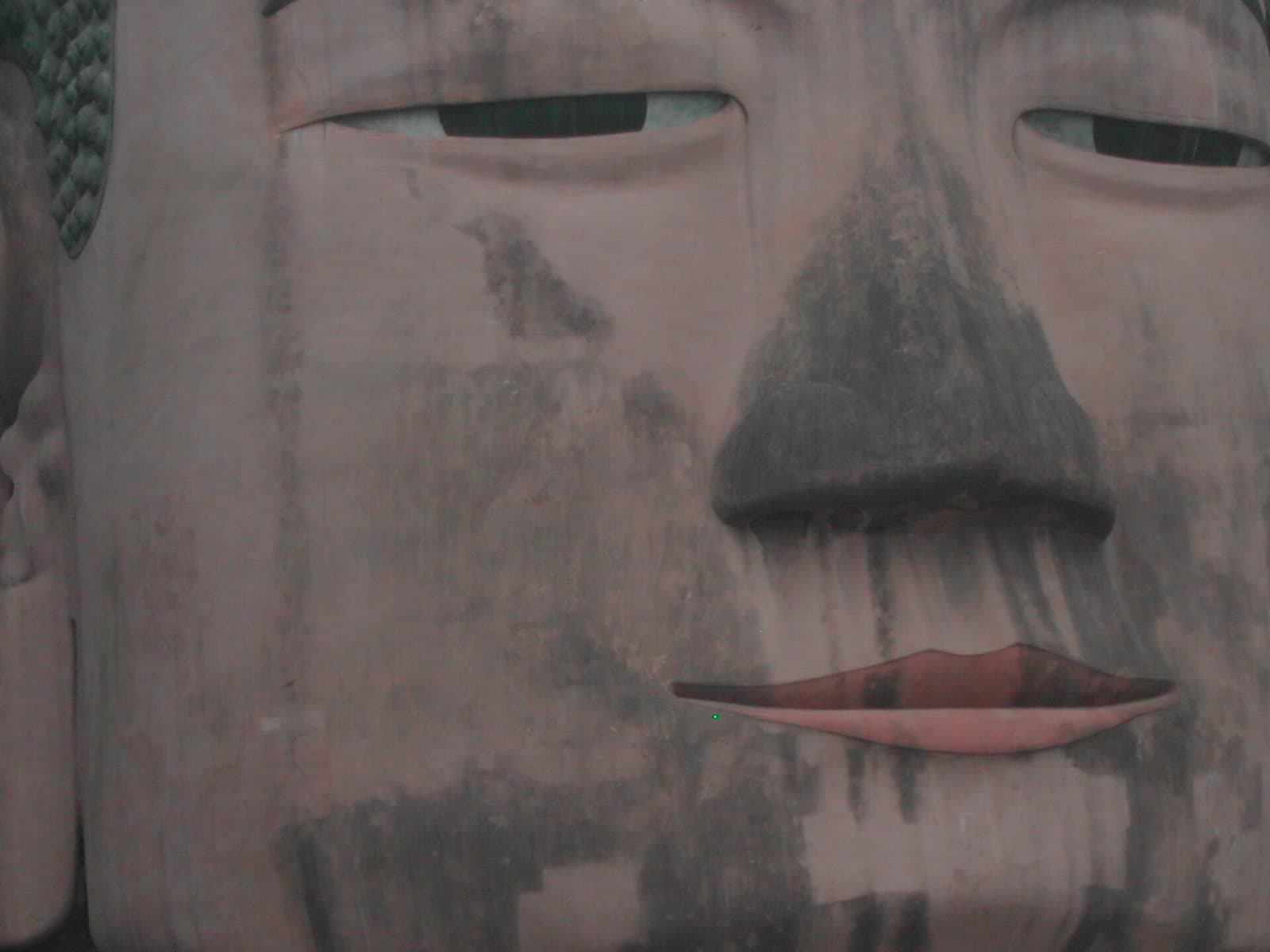 The Leshan Giant Buddha viewed from the river and cliff paths — view 2