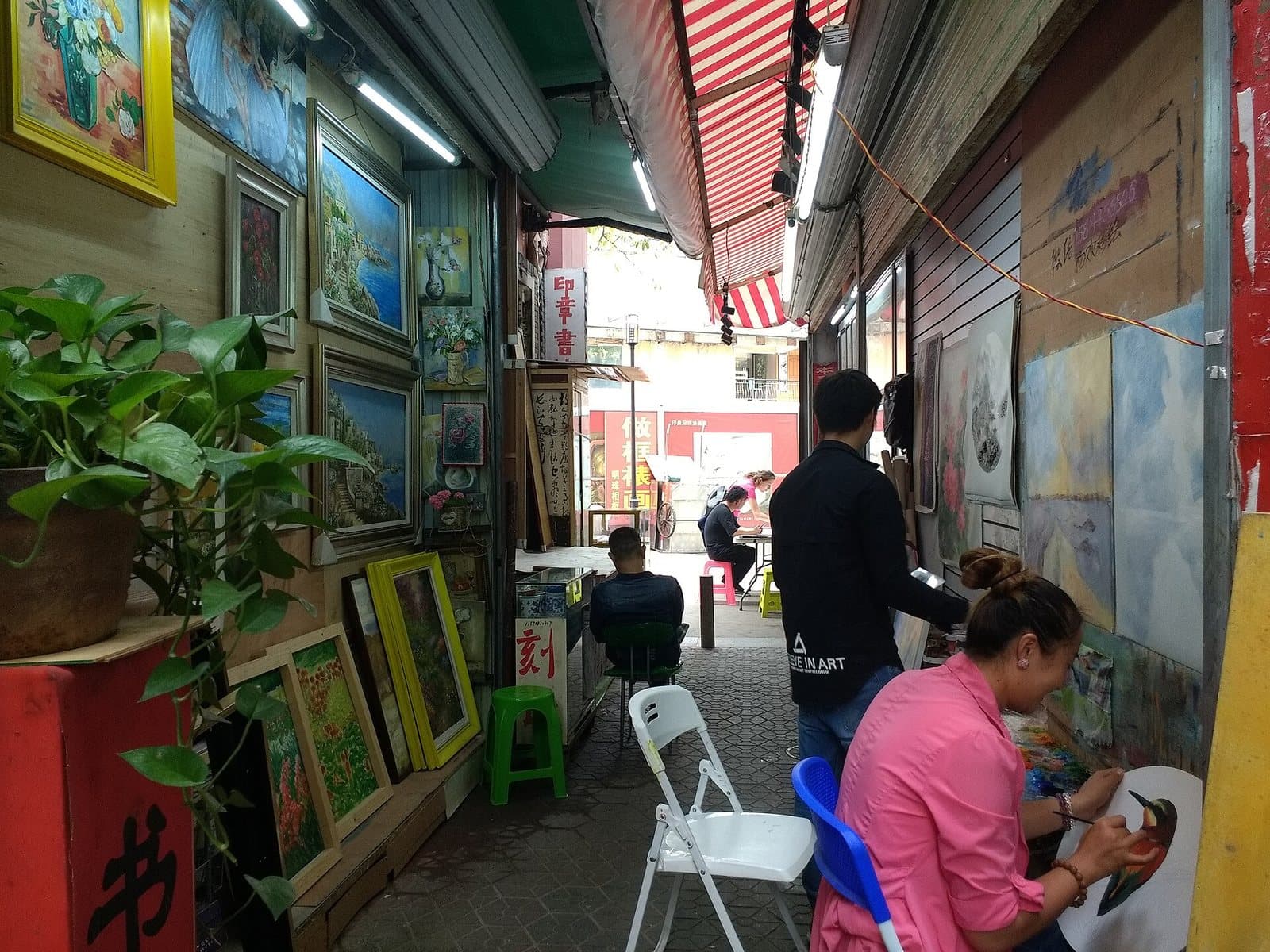 Painting studios and colorful lanes in Dafen Oil Painting Village — view 2